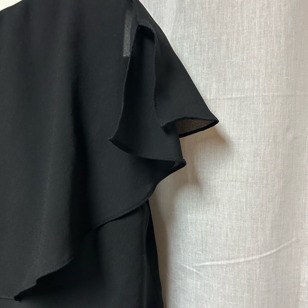 Black tiered sassy dress 
Cruise 
Hem 40” 23” armpit to armpit flat 
Size 18 - Picture 12 of 13